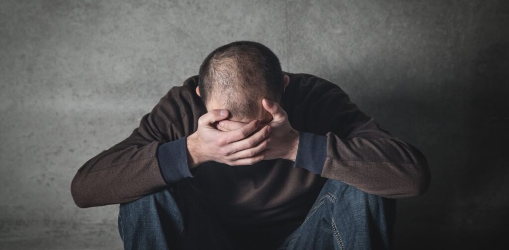 A young man suffering from childhood drama due to abuse.